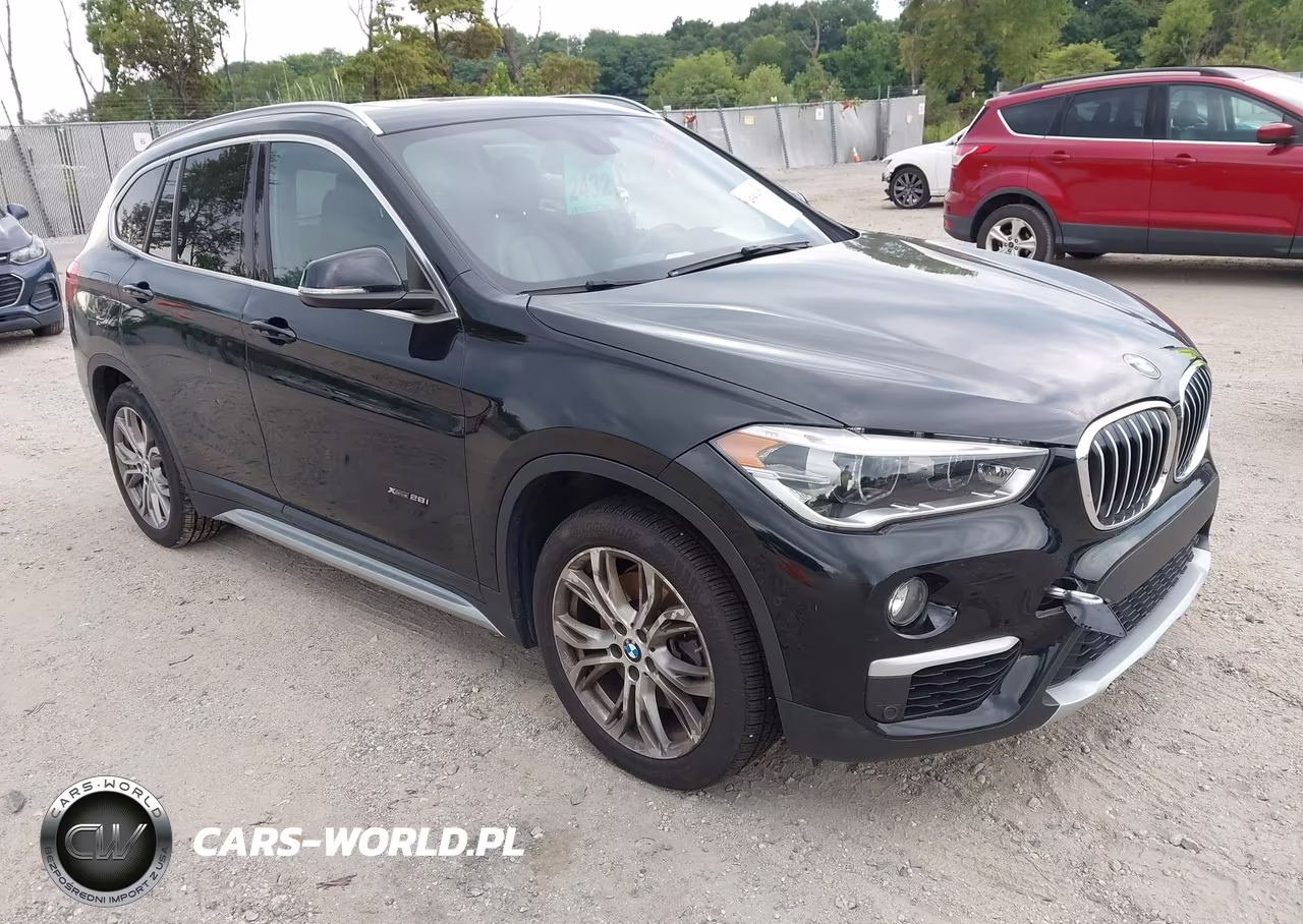 2017 BMW X1 xDrive28I VIN:WBXHT3Z35H4A56275 - 1