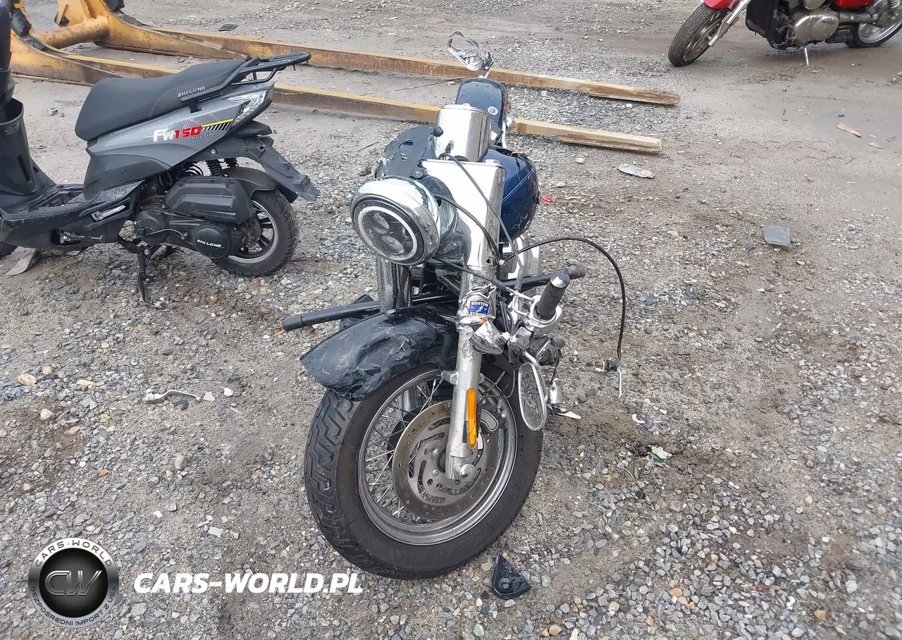 2012 Harley-Davidson Flstn Softail Deluxe VIN:1HD1JDV17CB011269 - 5