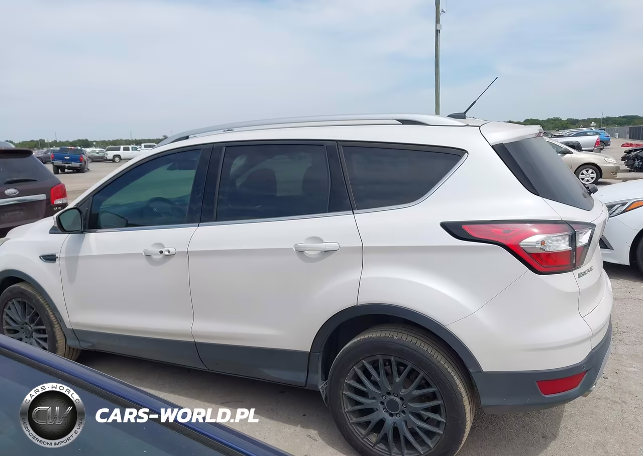 2017 Ford Escape Titanium VIN:1FMCU0J90HUD40098 - 14