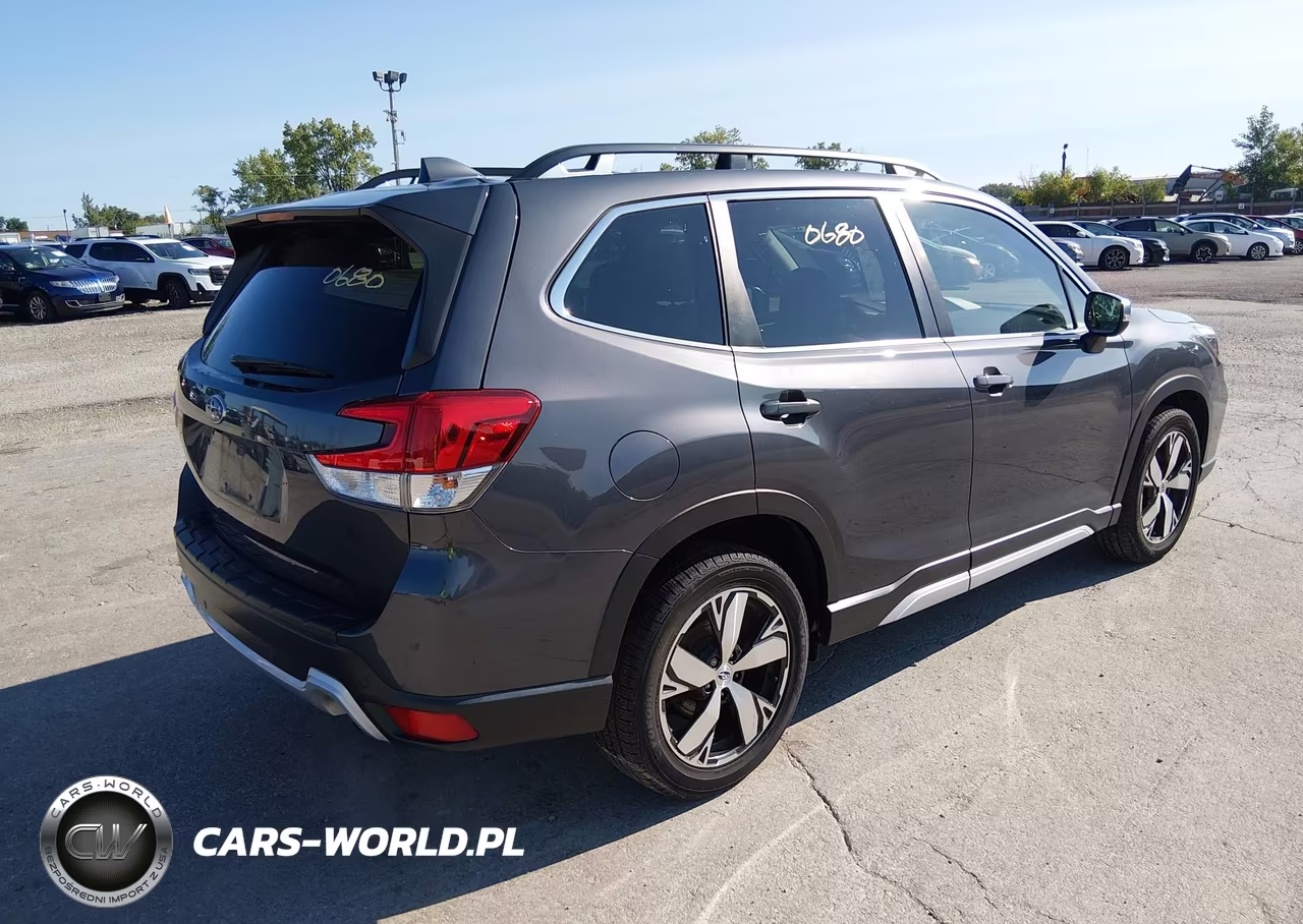 2020 Subaru Forester Touring VIN:JF2SKAXCXLH465594 - 4