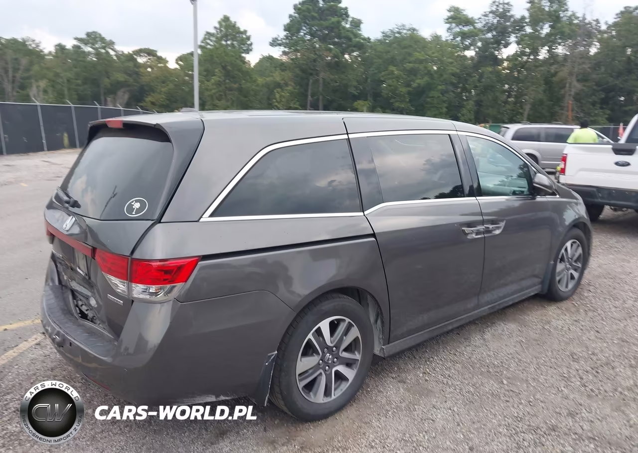 2015 Honda Odyssey Touring-Touring Elite VIN:5FNRL5H9XFB020183 - 4