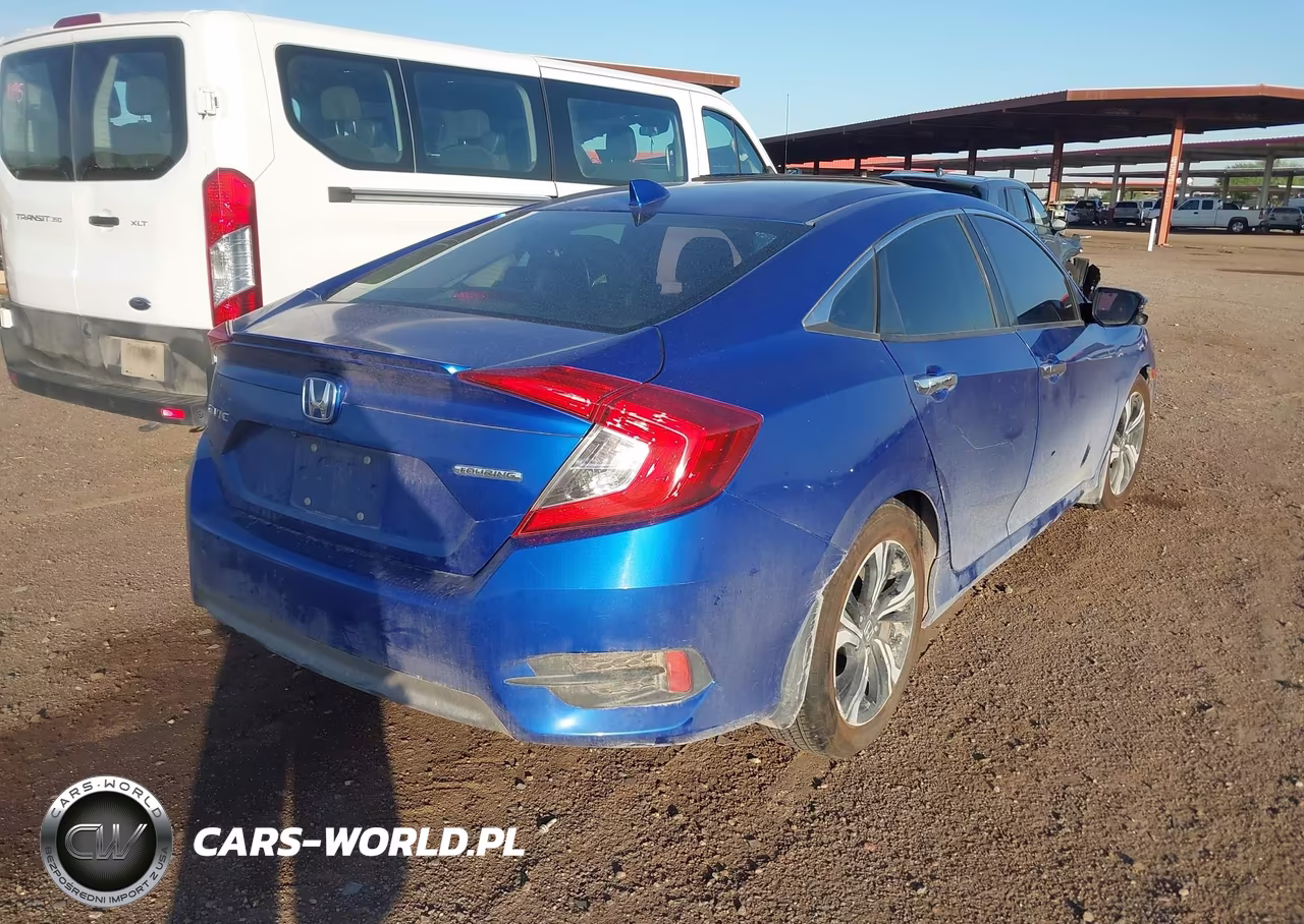 2017 Honda Civic Touring VIN:2HGFC1F92HH632908 - 4
