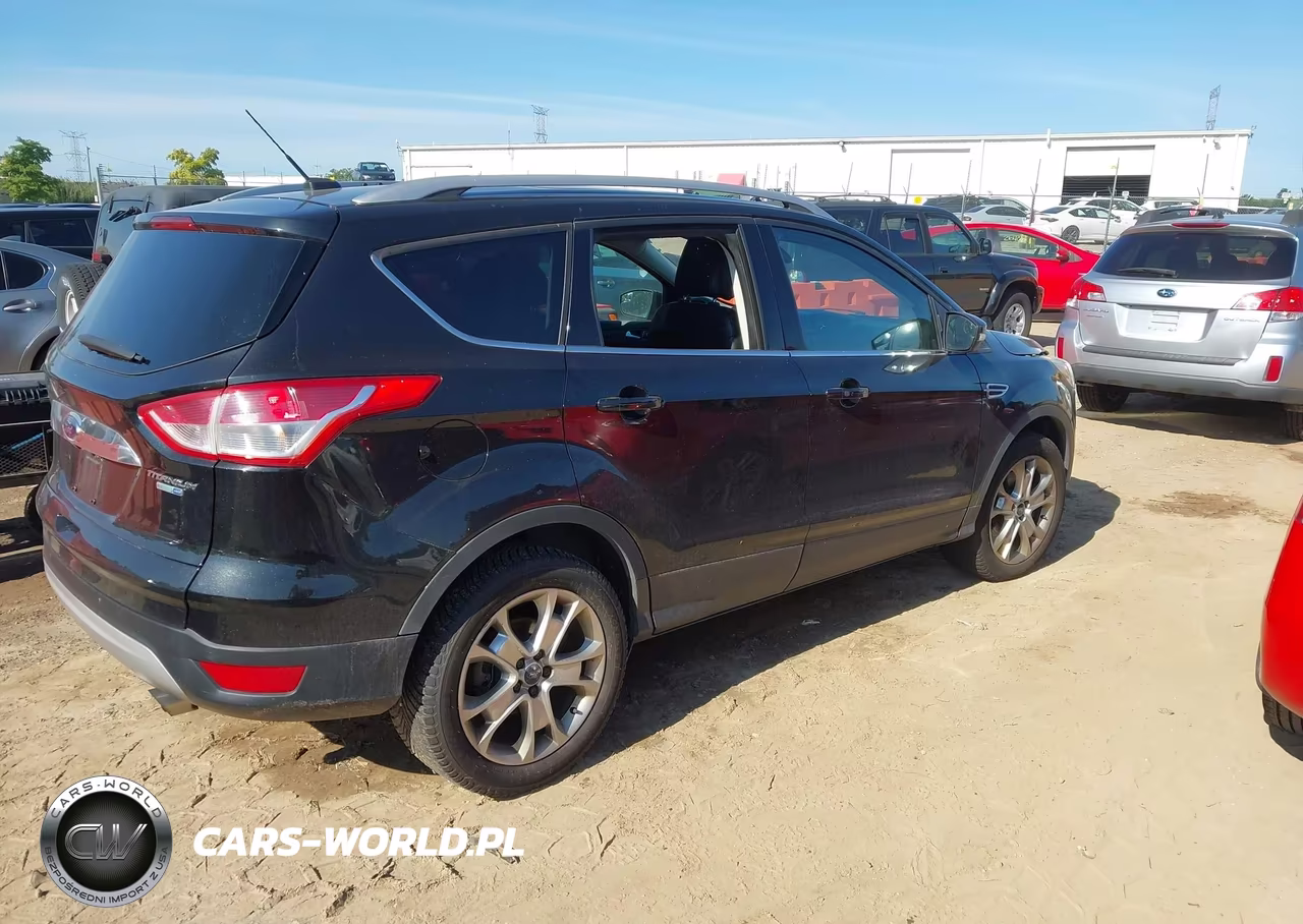 2015 Ford Escape Titanium VIN:1FMCU9J98FUA83497 - 4