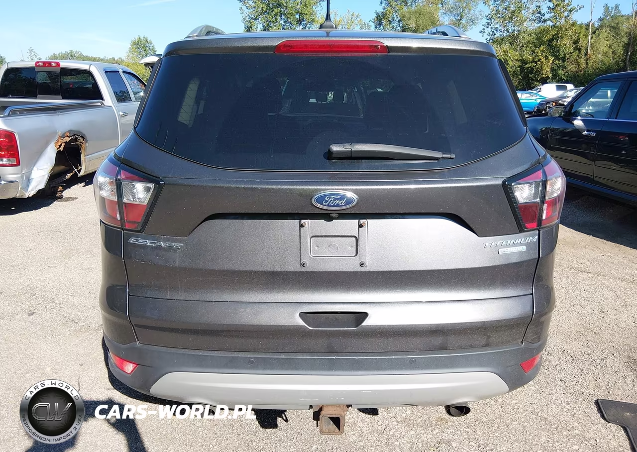 2018 Ford Escape Titanium VIN:1FMCU0J95JUB82556 - 16