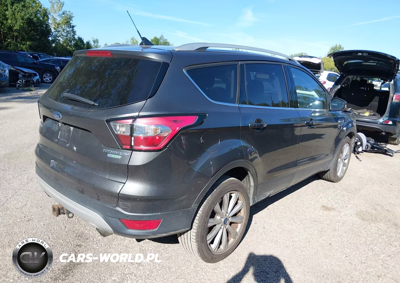 2018 Ford Escape Titanium VIN:1FMCU0J95JUB82556 - 4