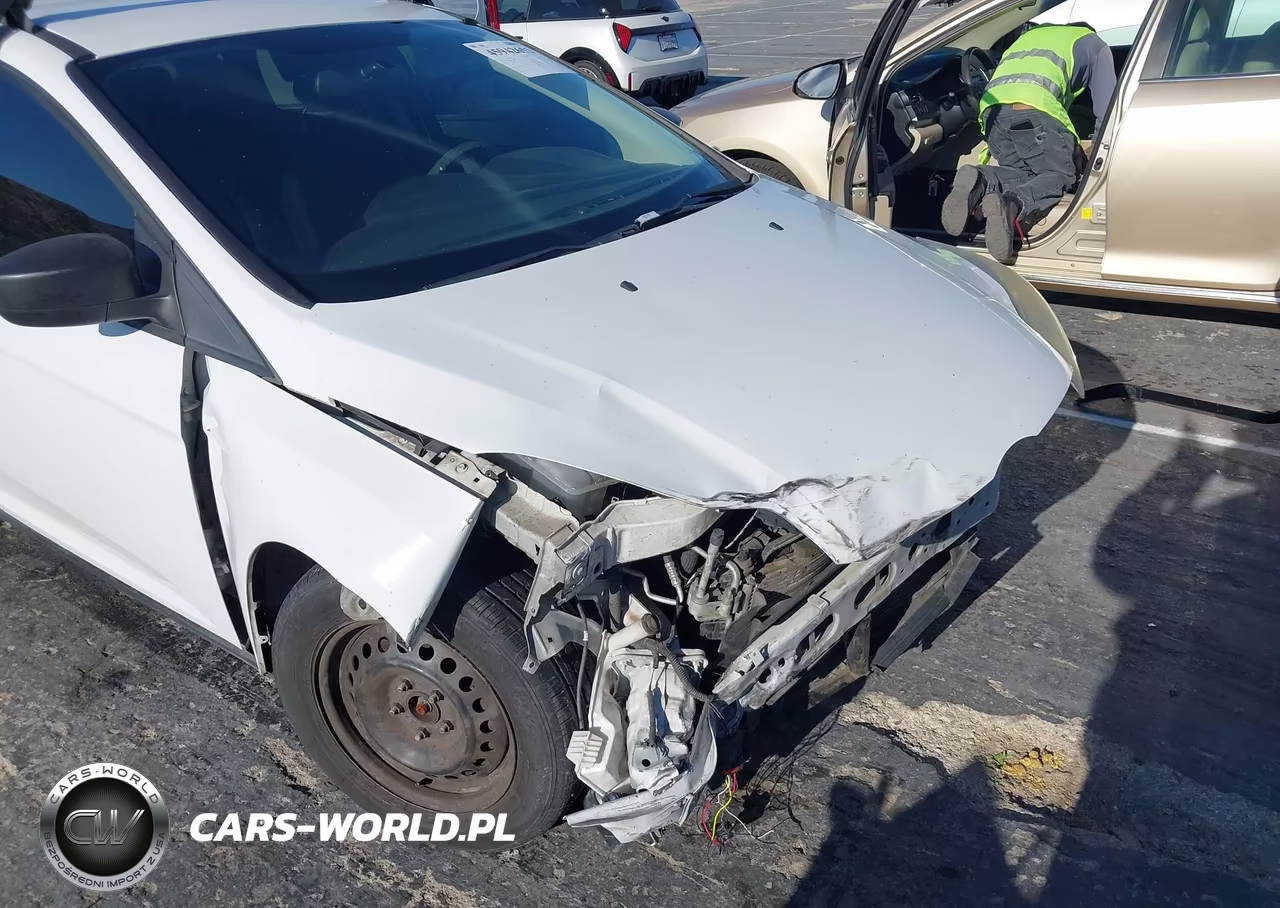 2014 Ford Focus S VIN:1FADP3E20EL462658 - 13