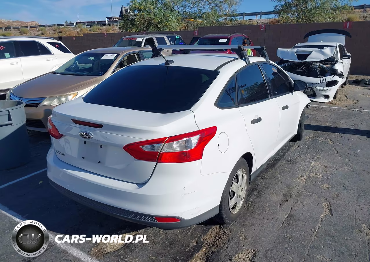 2014 Ford Focus S VIN:1FADP3E20EL462658 - 4