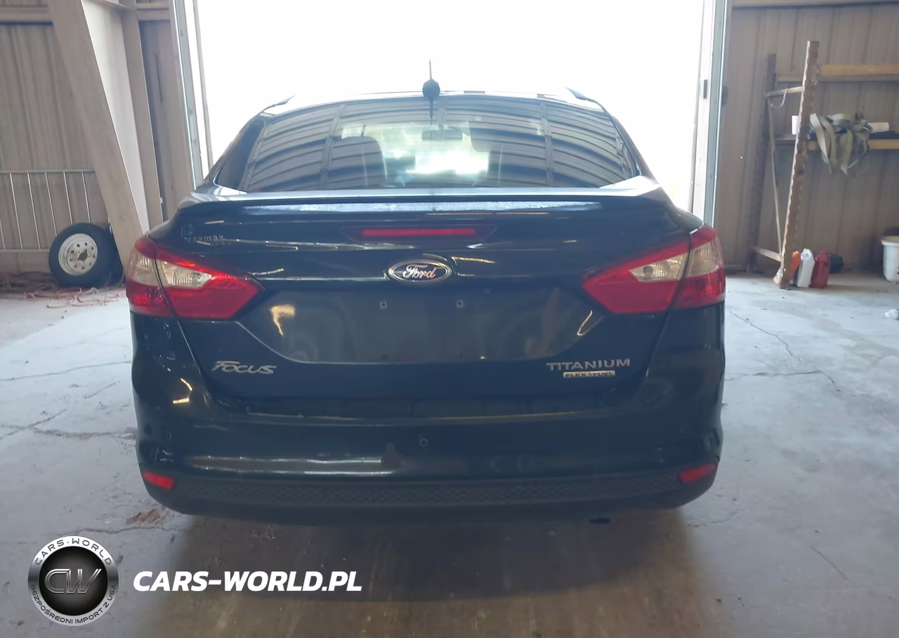 2013 Ford Focus Titanium VIN:1FADP3J2XDL334416 - 15
