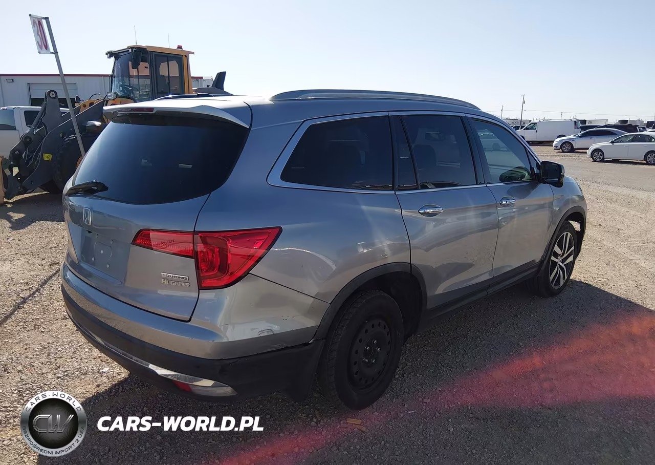 2018 Honda Pilot Touring VIN:5FNYF5H98JB006472 - 4