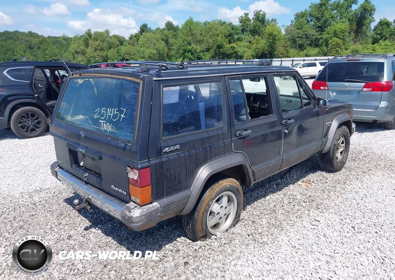 1990 Jeep Cherokee Laredo VIN:1J4FJ58L4LL251457 - 4
