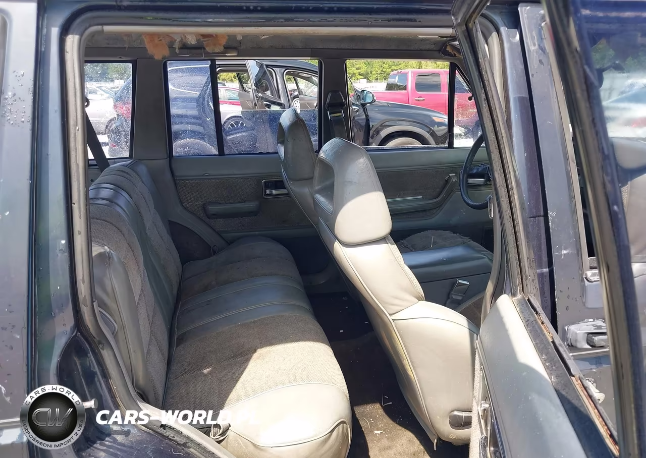 1990 Jeep Cherokee Laredo VIN:1J4FJ58L4LL251457 - 8