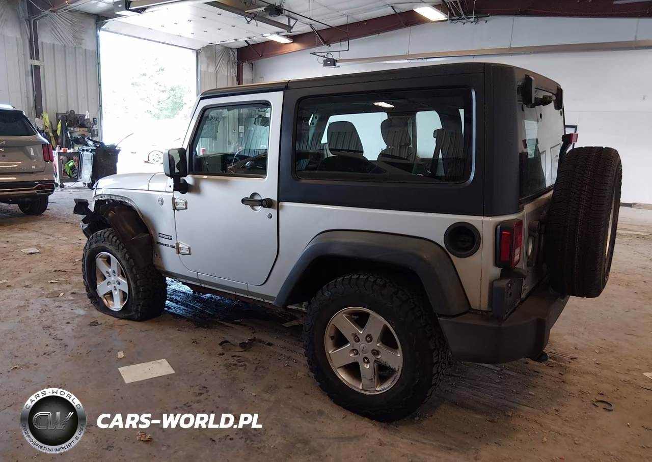 2012 Jeep Wrangler Sport VIN:1C4AJWAG0CL208415 - 3