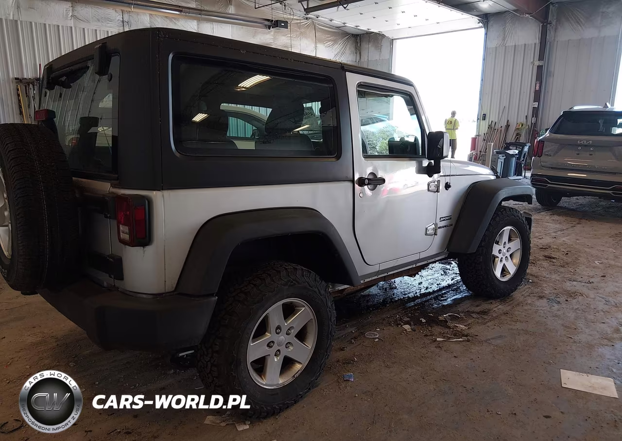 2012 Jeep Wrangler Sport VIN:1C4AJWAG0CL208415 - 4