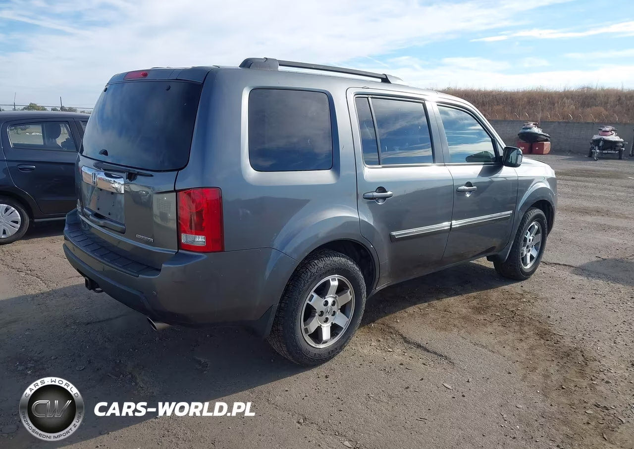 2011 Honda Pilot Touring VIN:5FNYF3H90BB027032 - 4