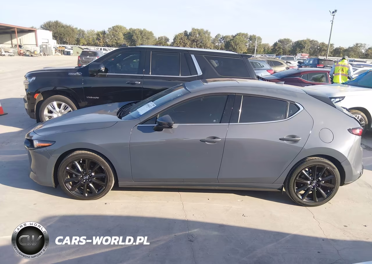 2020 Mazda Mazda3 Premium Package VIN:JM1BPANMXL1155370 - 14