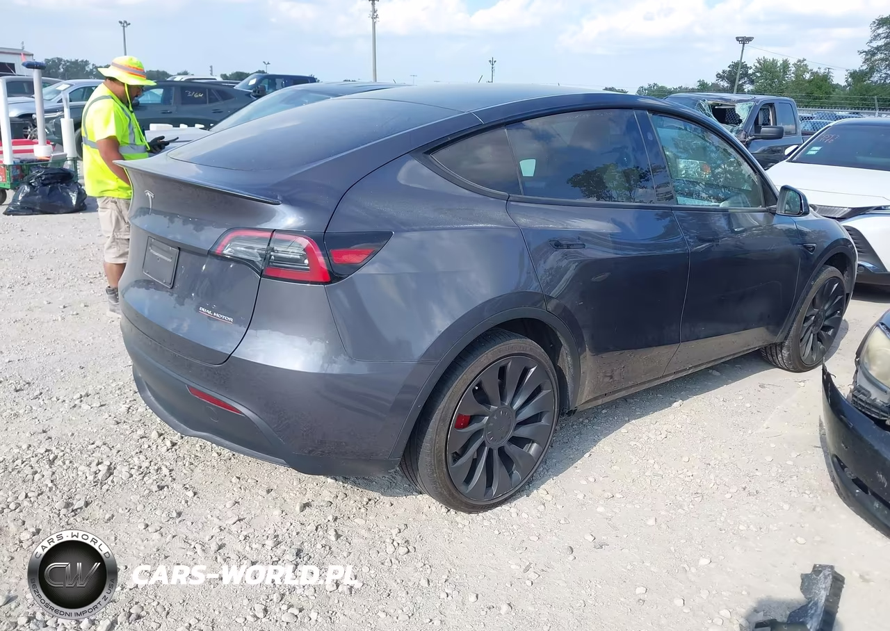 2023 Tesla Model Y Performance Dual Motor All-Wheel Drive VIN:7SAYGDEF1PF864413 - 4