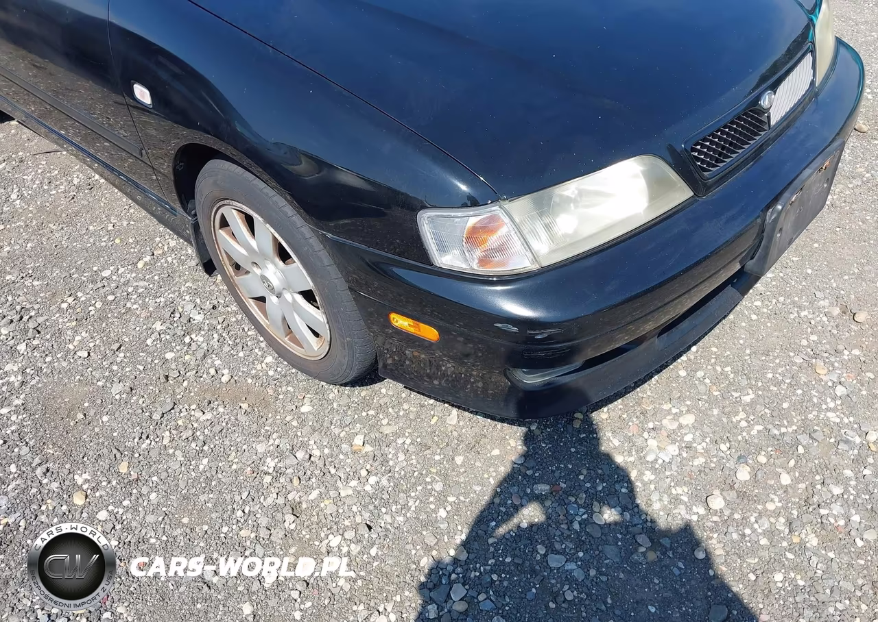 2002 Infiniti G20 Luxury VIN:JNKCP11AX2T504769 - 6