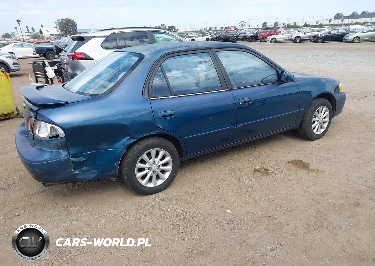 2002 Toyota Corolla Le VIN:1NXBR12E52Z582486 - 4