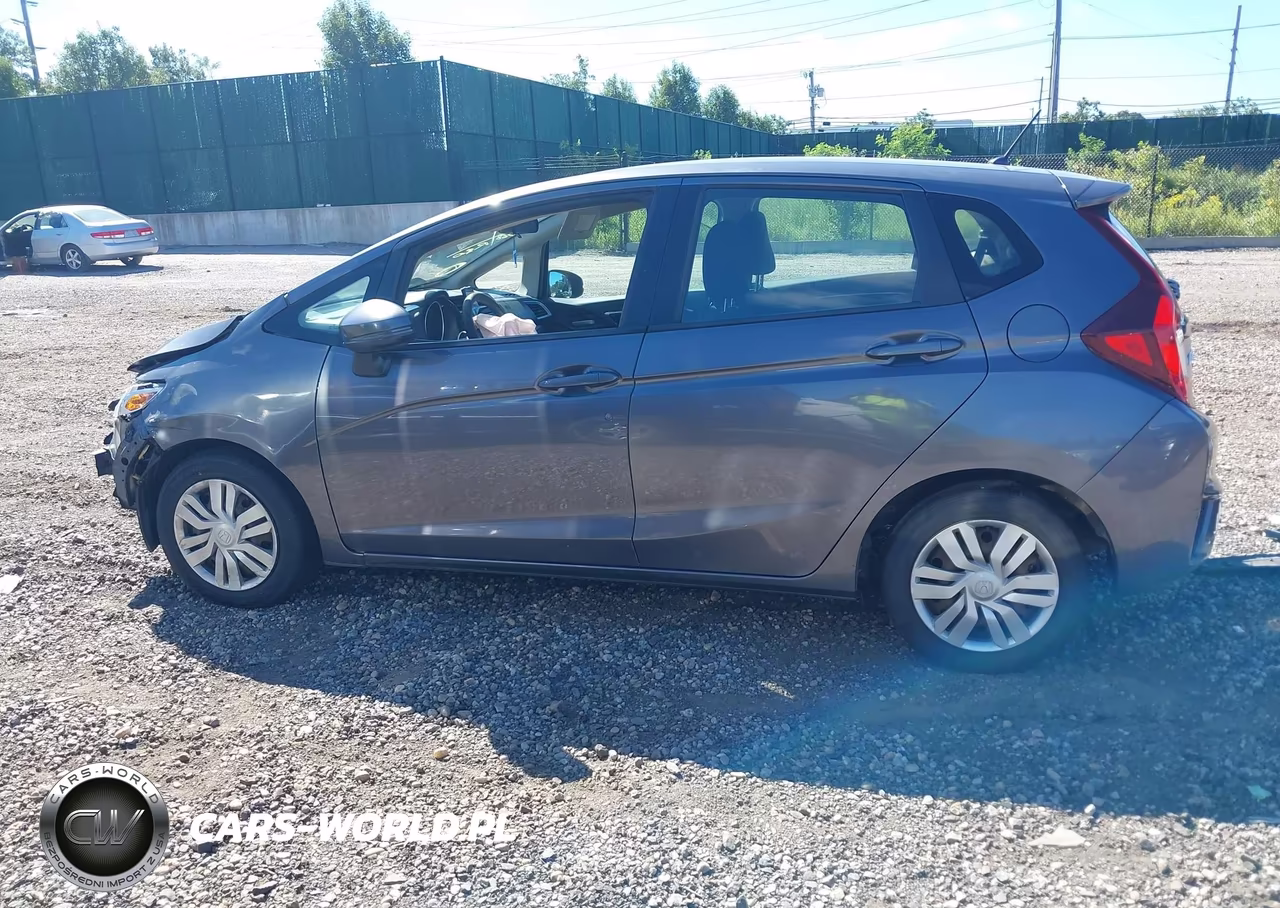 2016 Honda Fit Lx VIN:3HGGK5H58GM704610 - 14