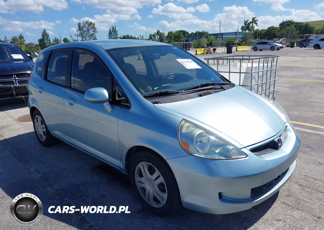 2007 Honda Fit VIN:JHMGD38427S051881 - 1
