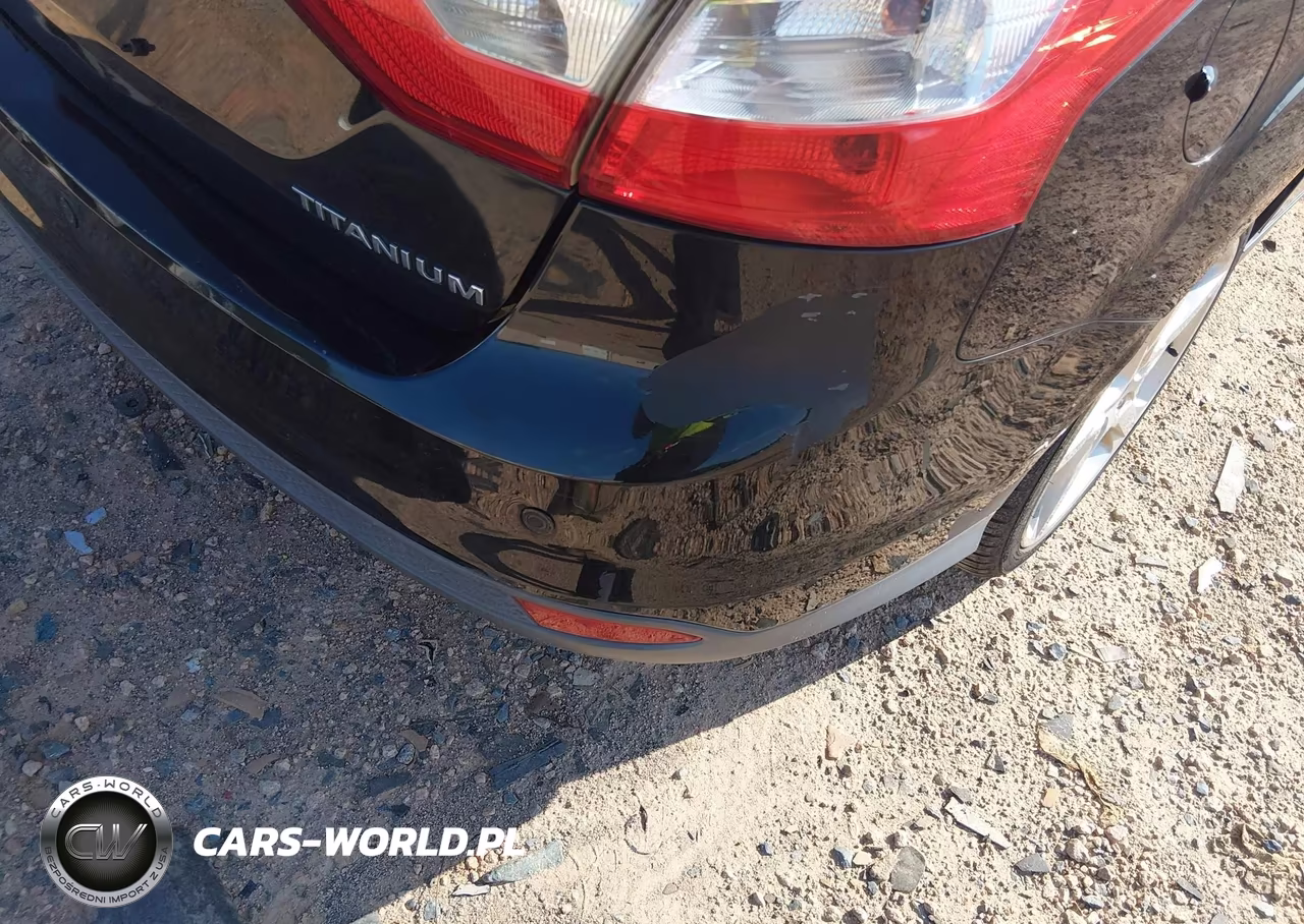 2013 Ford Focus Titanium VIN:1FADP3J20DL231490 - 13