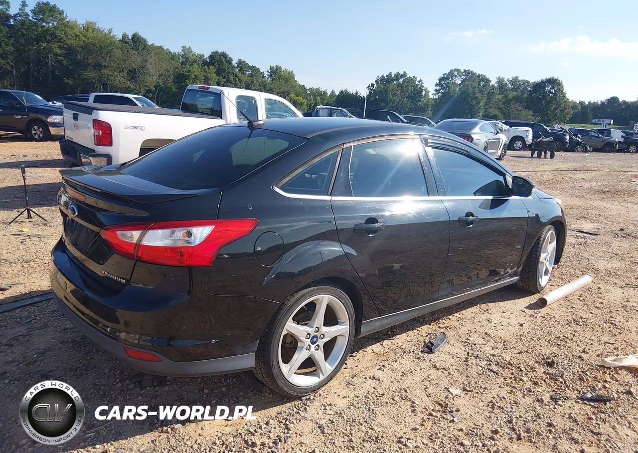 2013 Ford Focus Titanium VIN:1FADP3J20DL231490 - 4