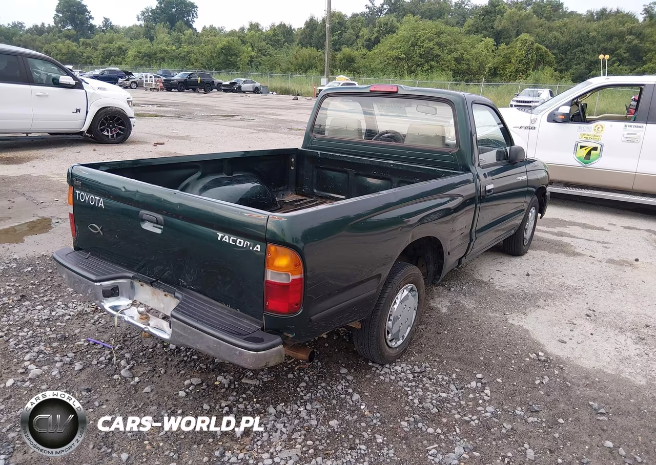 1999 Toyota Tacoma VIN:4TANL42N0XZ551981 - 4