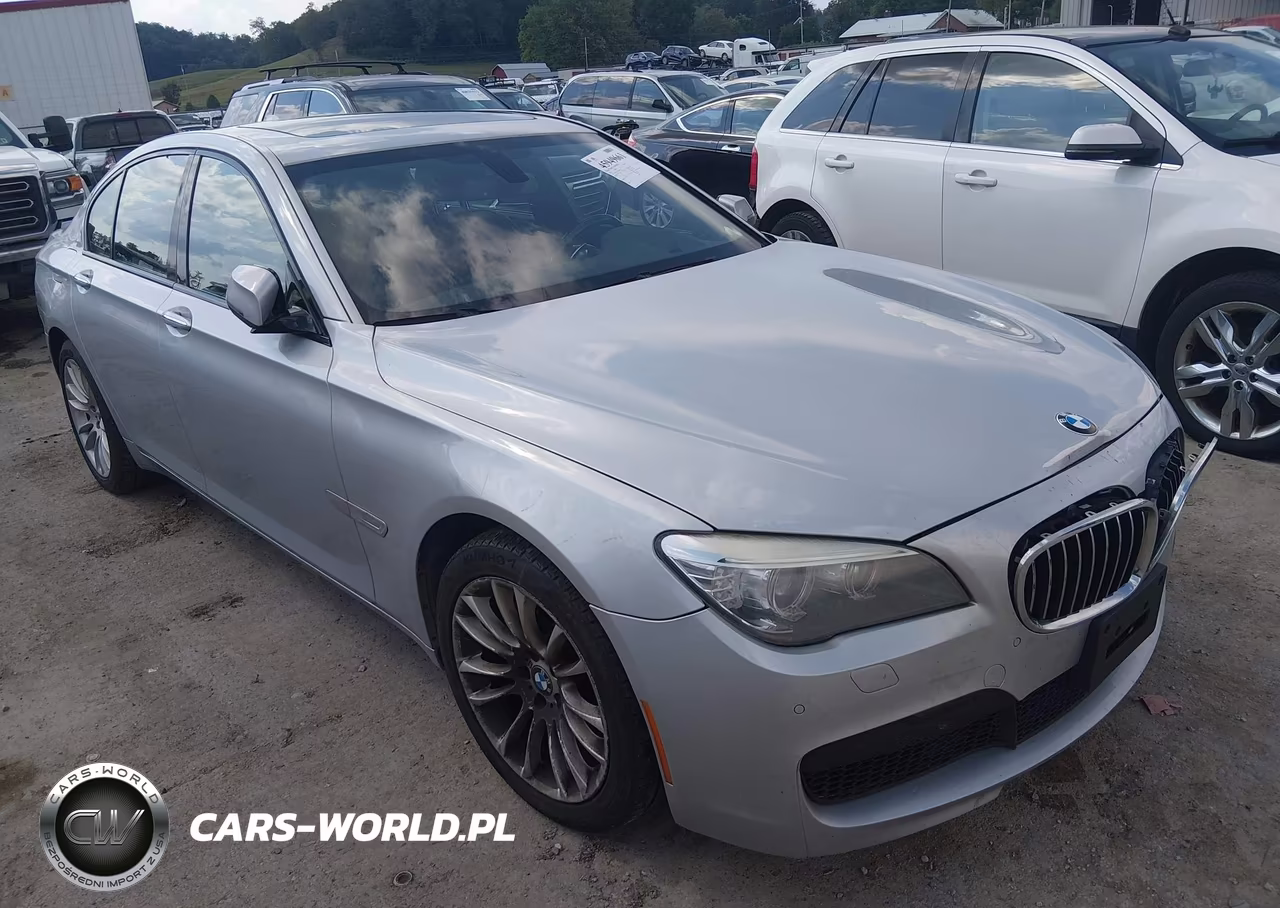 2015 BMW 740I VIN:WBAYA6C52FGK16679 - 1