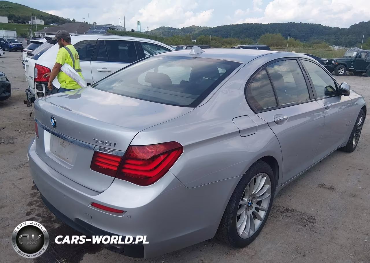 2015 BMW 740I VIN:WBAYA6C52FGK16679 - 4
