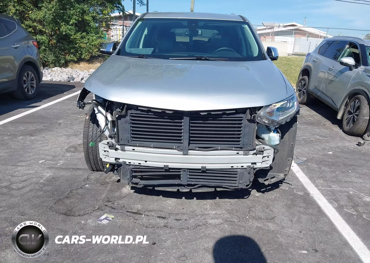 2018 Chevrolet Traverse Premier VIN:1GNERKKW6JJ135933 - 6