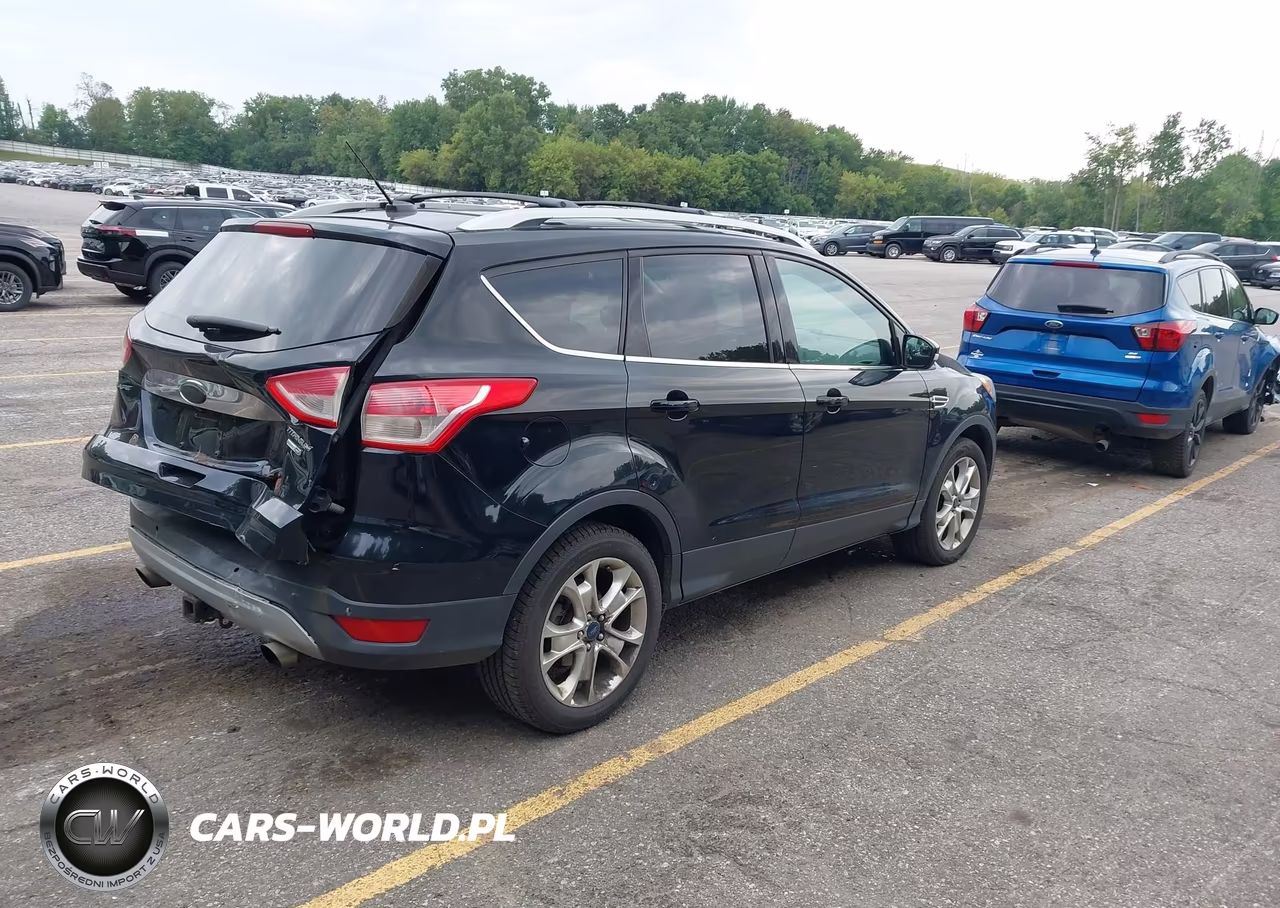 2016 Ford Escape Titanium VIN:1FMCU9J9XGUA41933 - 4