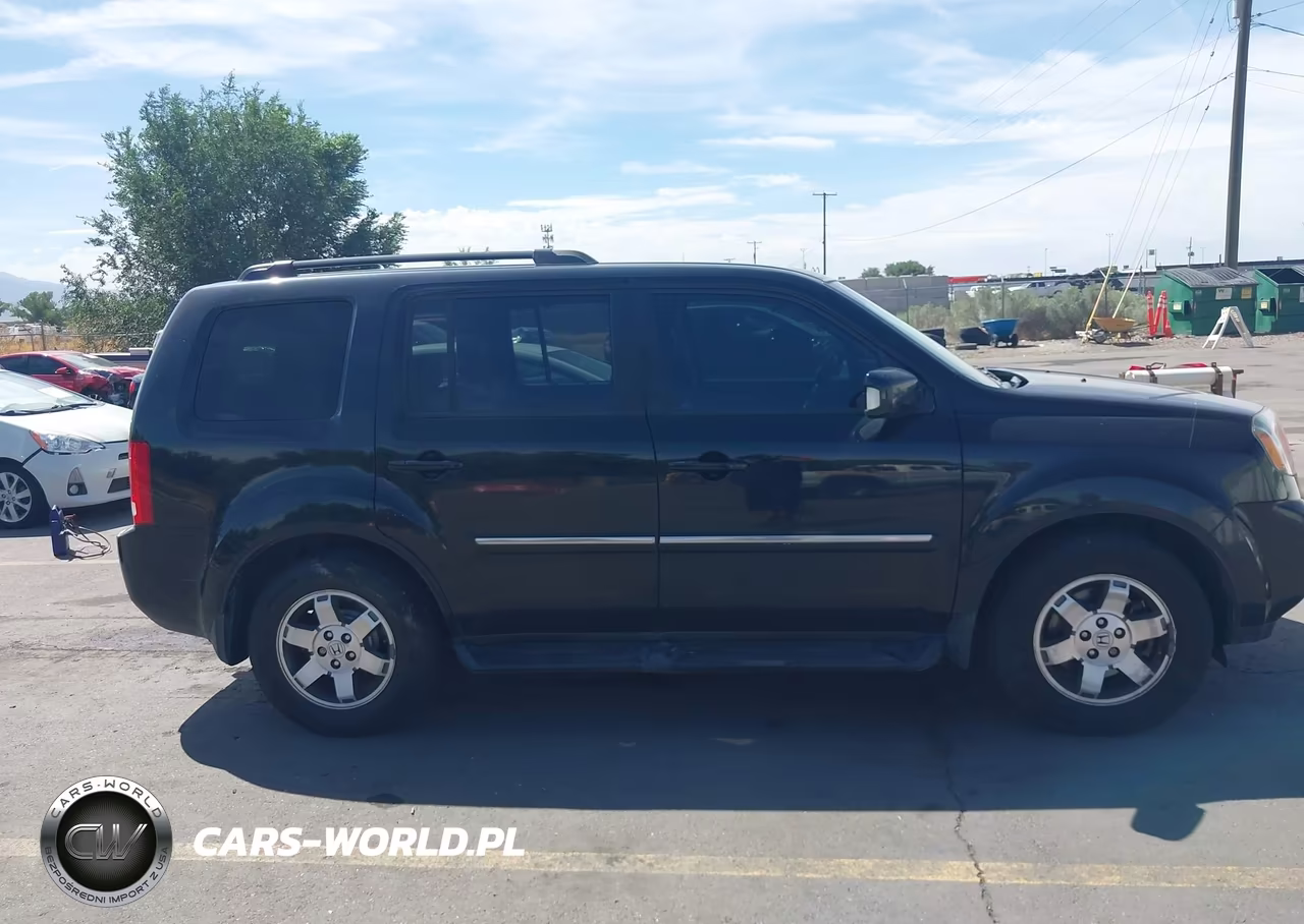 2011 Honda Pilot Touring VIN:5FNYF4H90BB017560 - 13