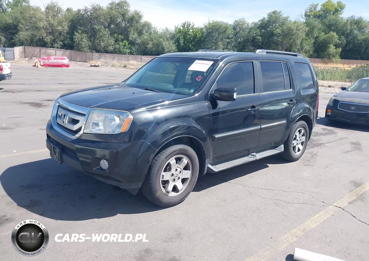 2011 Honda Pilot Touring VIN:5FNYF4H90BB017560 - 2