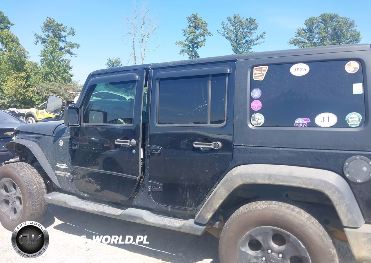 2011 Jeep Wrangler Unlimited Sahara VIN:1J4BA5H15BL533277 - 14