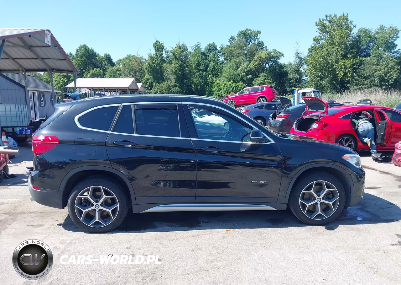 2018 BMW X1 xDrive28I VIN:WBXHT3C3XJ5F89425 - 13
