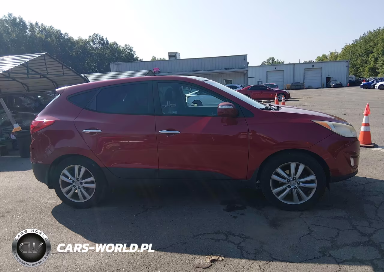 2012 Hyundai Tucson Limited VIN:KM8JUCAC8CU545424 - 13
