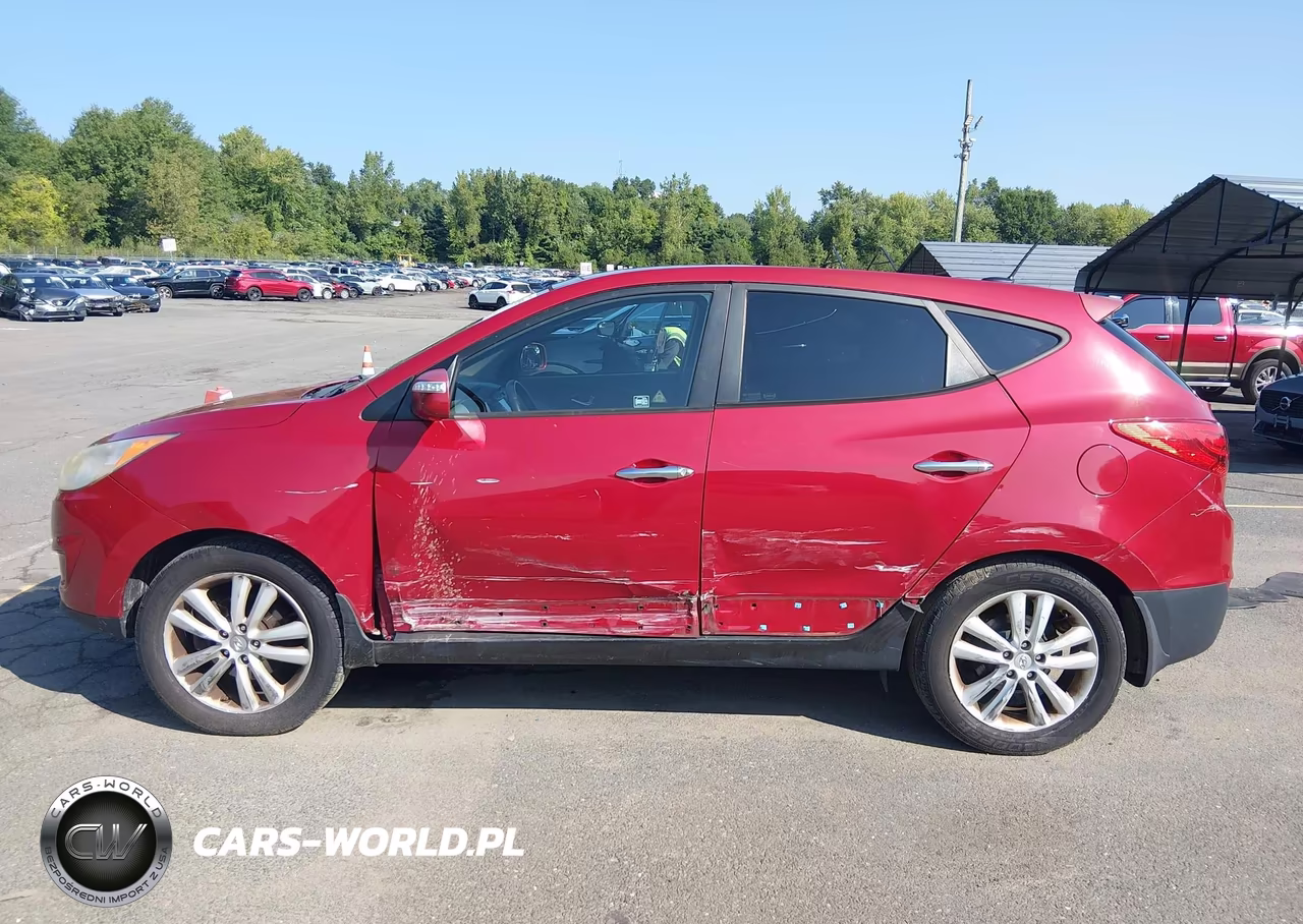 2012 Hyundai Tucson Limited VIN:KM8JUCAC8CU545424 - 14