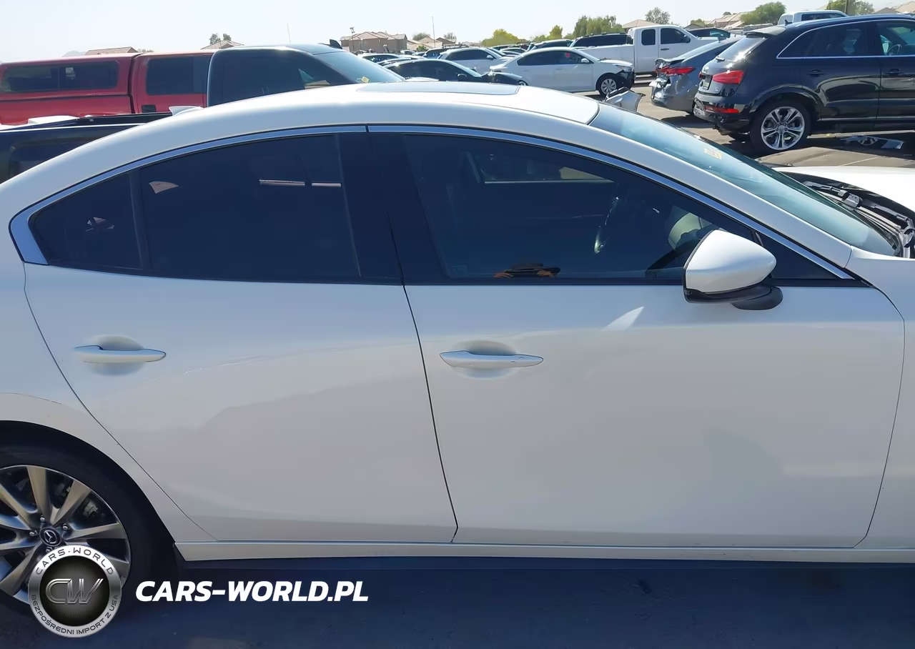 2022 Mazda Mazda3 Premium VIN:3MZBPADL4NM312063 - 13
