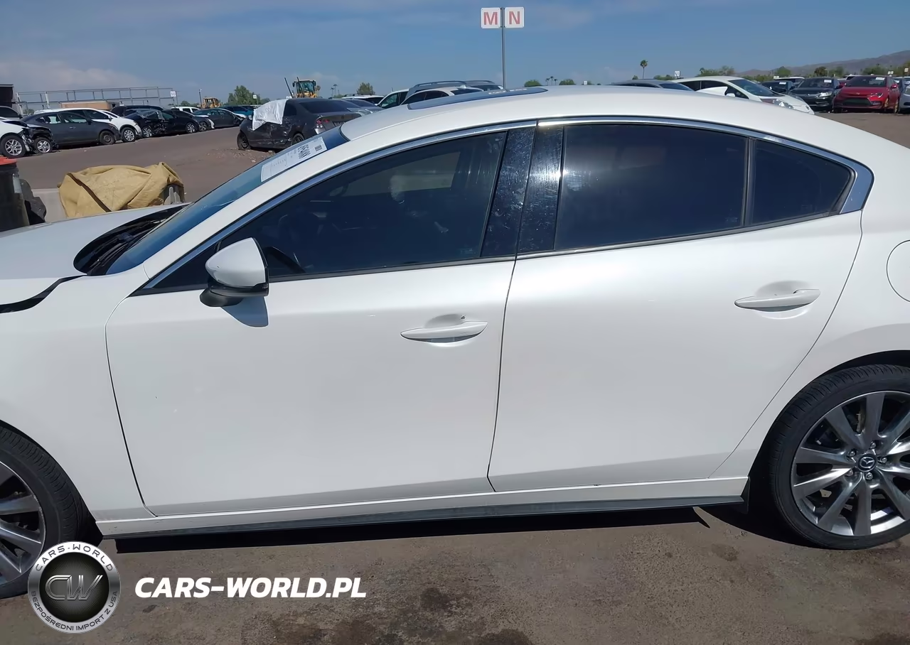 2022 Mazda Mazda3 Premium VIN:3MZBPADL4NM312063 - 14