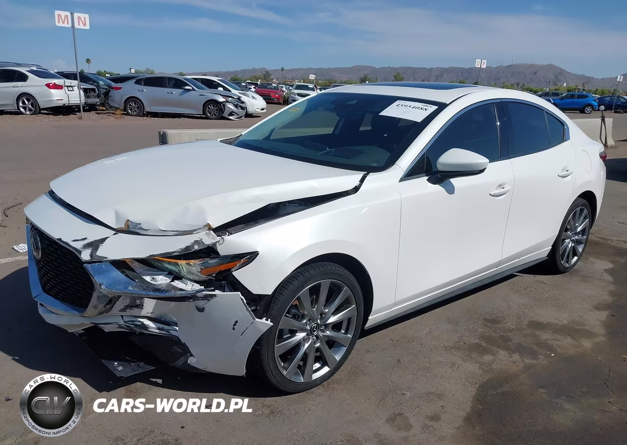 2022 Mazda Mazda3 Premium VIN:3MZBPADL4NM312063 - 6