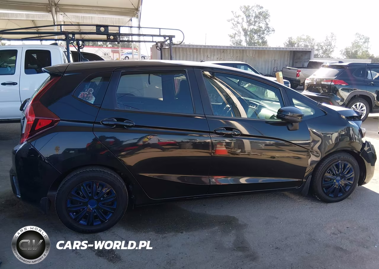 2015 Honda Fit Lx VIN:3HGGK5H57FM715385 - 14