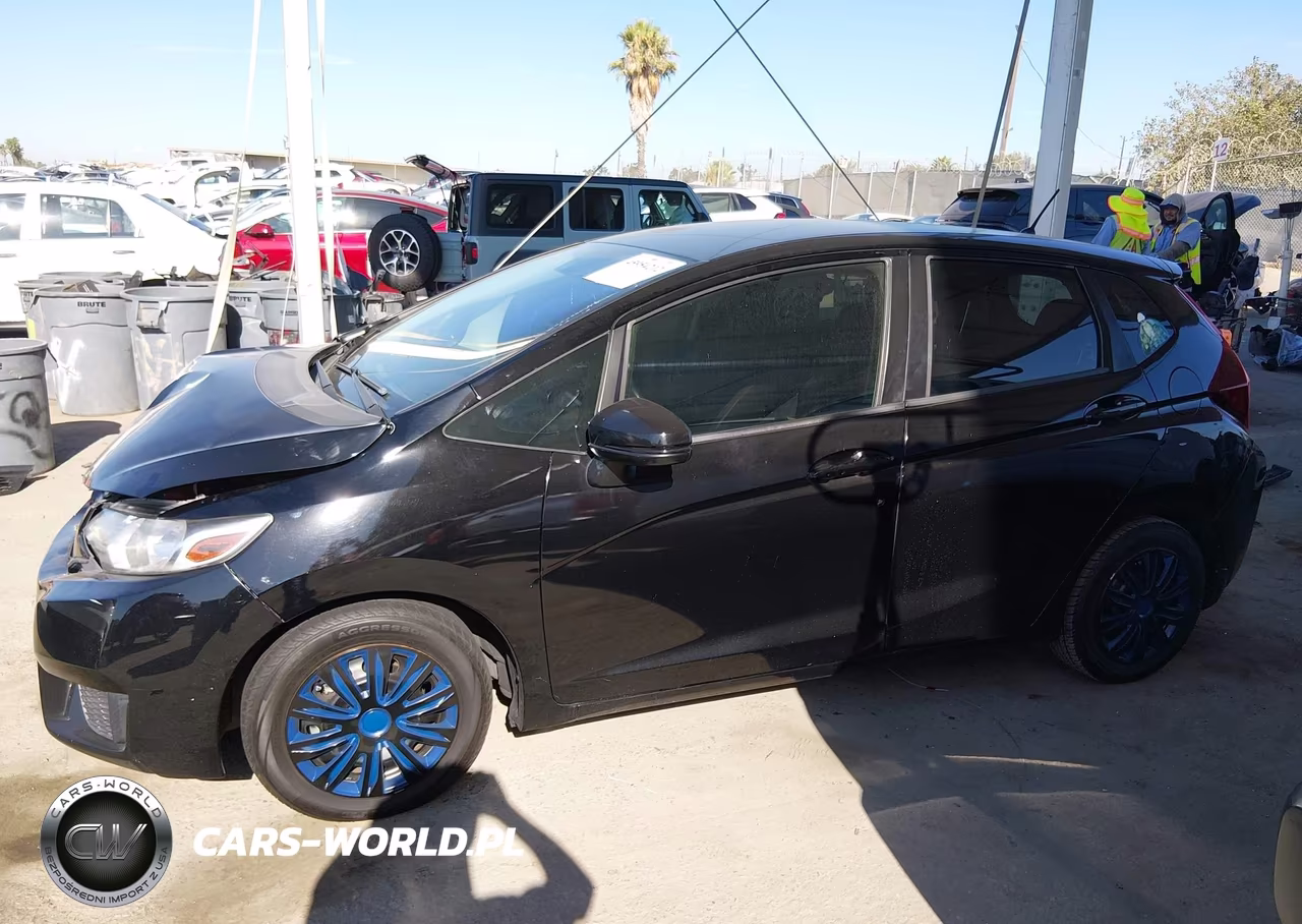 2015 Honda Fit Lx VIN:3HGGK5H57FM715385 - 15