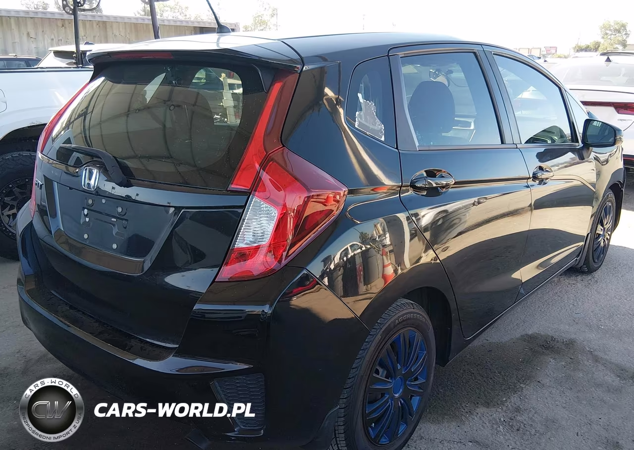 2015 Honda Fit Lx VIN:3HGGK5H57FM715385 - 4