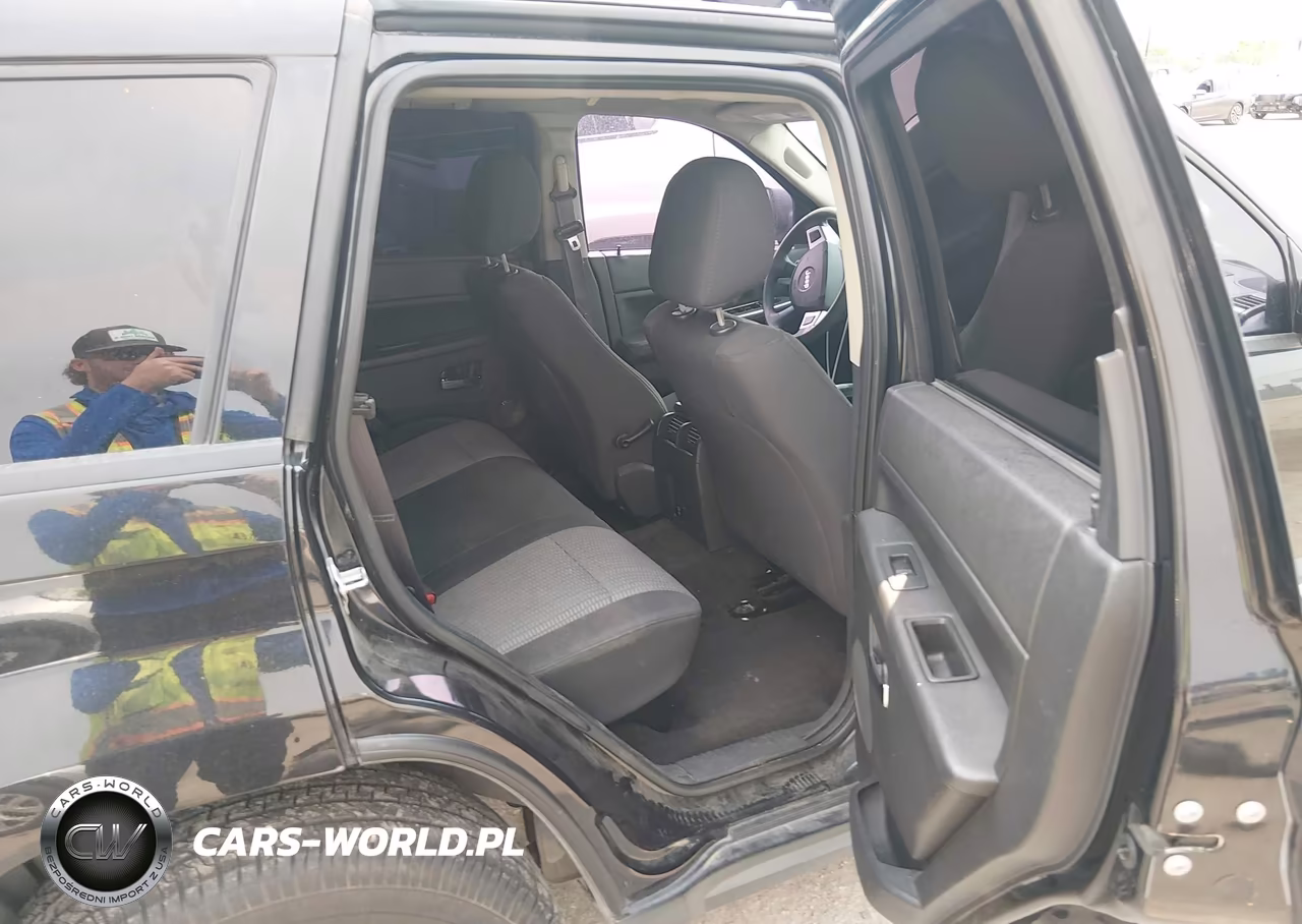 2009 Jeep Grand Cherokee Laredo VIN:1J8GR48K89C544901 - 8