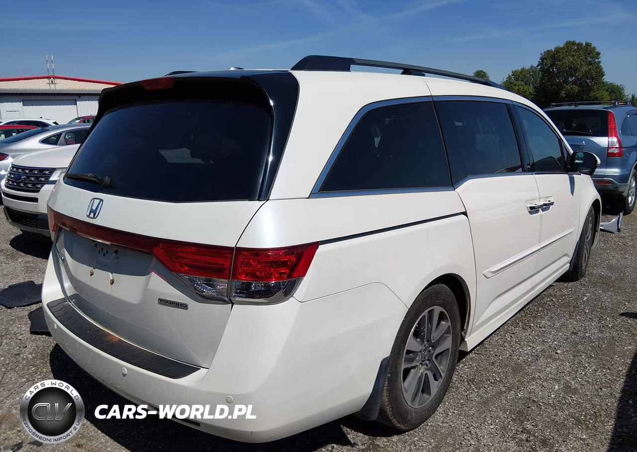 2016 Honda Odyssey Touring-Touring Elite VIN:5FNRL5H9XGB133651 - 4