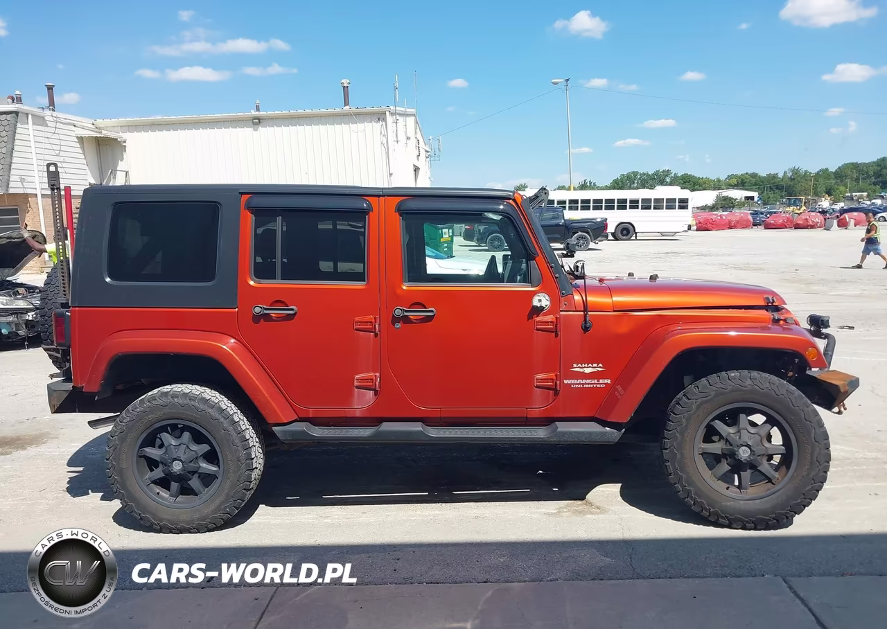 2009 Jeep Wrangler Unlimited Sahara VIN:1J4GA59169L781309 - 14
