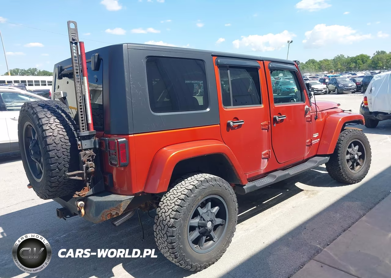 2009 Jeep Wrangler Unlimited Sahara VIN:1J4GA59169L781309 - 4