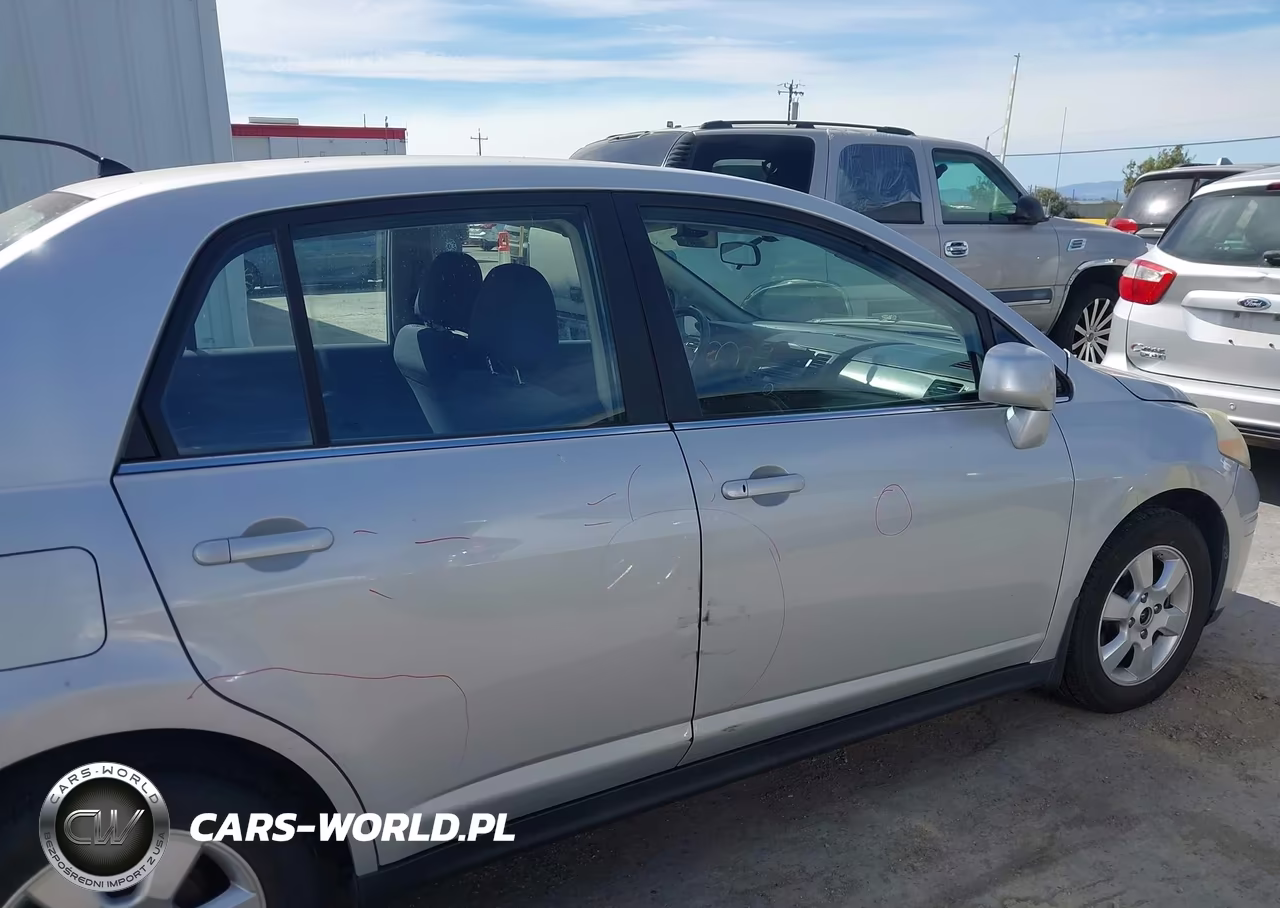 2009 Nissan Versa 1.8Sl VIN:3N1BC11E79L351975 - 13