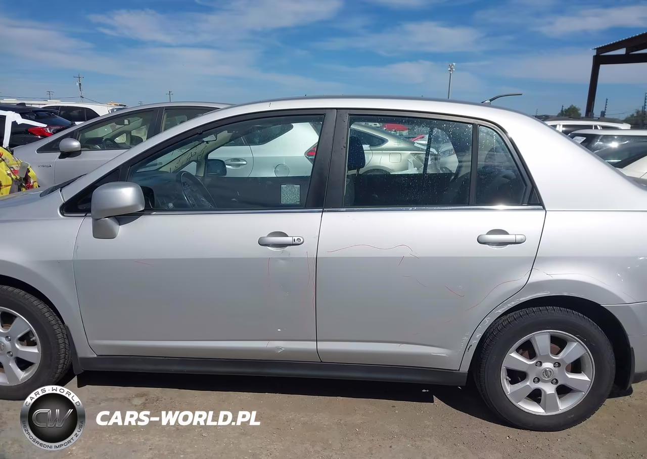 2009 Nissan Versa 1.8Sl VIN:3N1BC11E79L351975 - 14