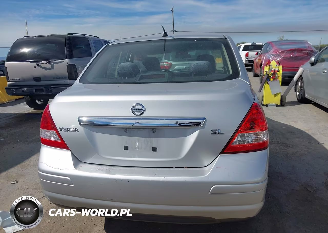 2009 Nissan Versa 1.8Sl VIN:3N1BC11E79L351975 - 16